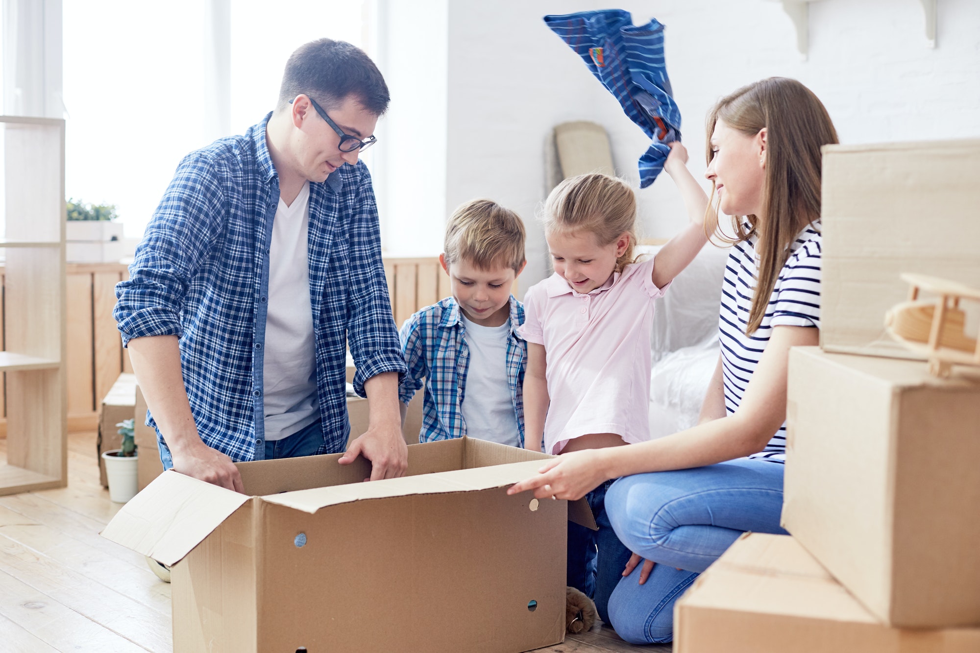 packing-moving-boxes-with-children.jpg